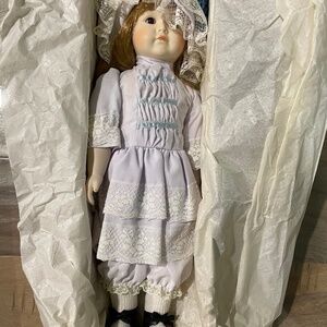 Vintage (but new) Musical Porcelain Bisque Doll